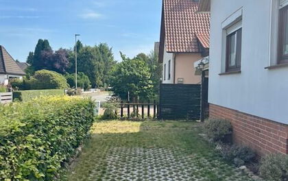 Kleines Einfamilienhaus mit großem Garten in zentraler Lage von Grasberg