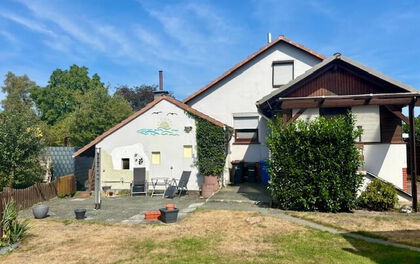 Kleines Einfamilienhaus mit großem Garten in zentraler Lage von Grasberg