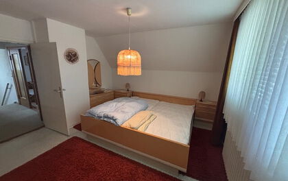 Einfamilienhaus mit zusätzlichem Nebengebäude und großzügigem Garten in zentraler Lage von Grasberg