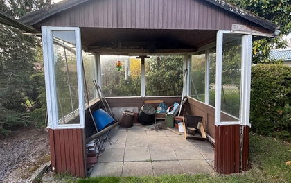 Einfamilienhaus mit zusätzlichem Nebengebäude und großzügigem Garten in zentraler Lage von Grasberg
