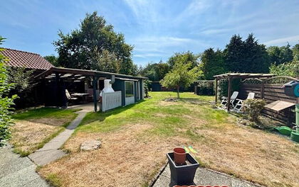 Kleines Einfamilienhaus mit großem Garten in zentraler Lage von Grasberg