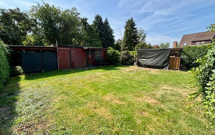 Kleines Einfamilienhaus mit großem Garten in zentraler Lage von Grasberg